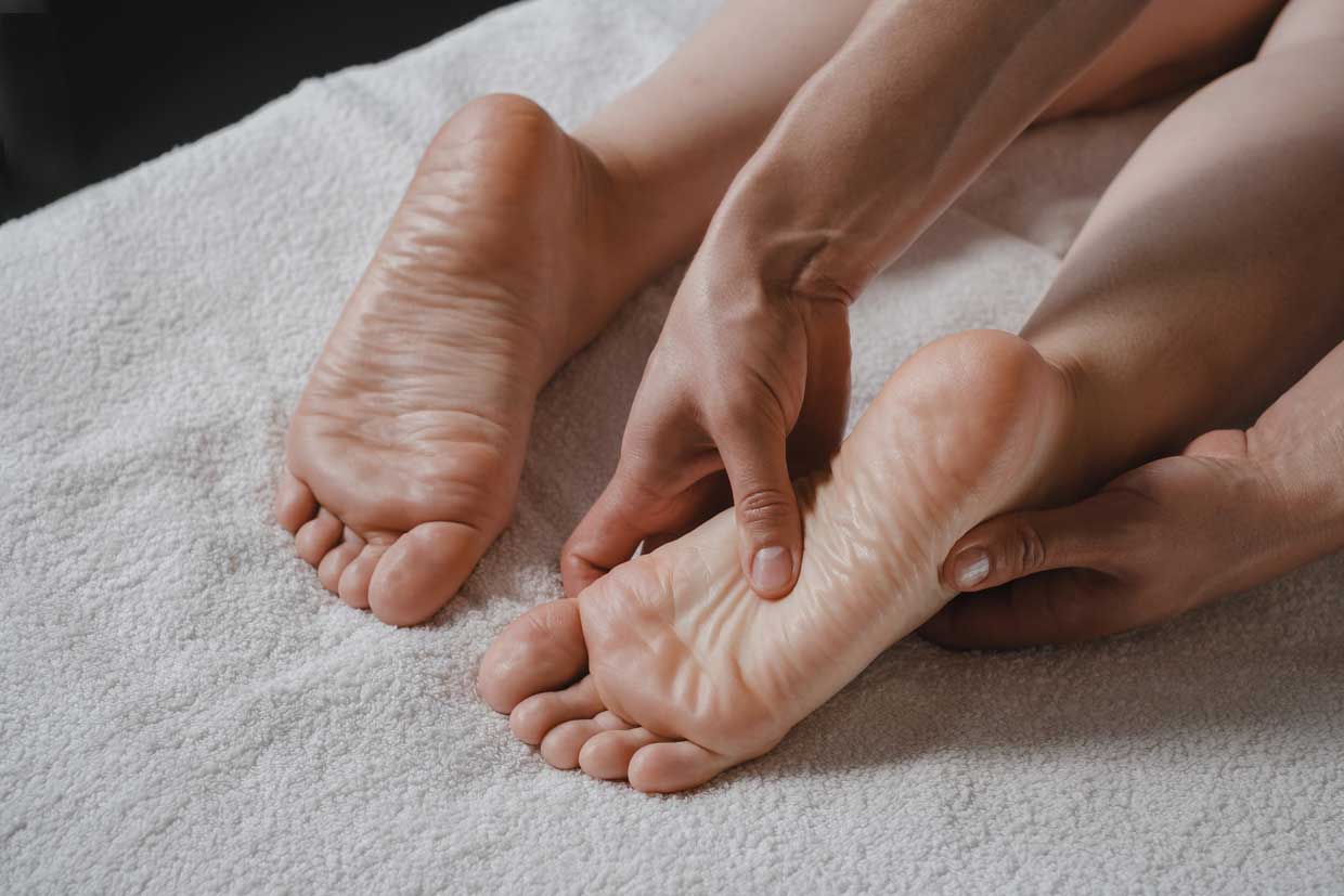 professional-reflexology-foot-massage-close-up-web